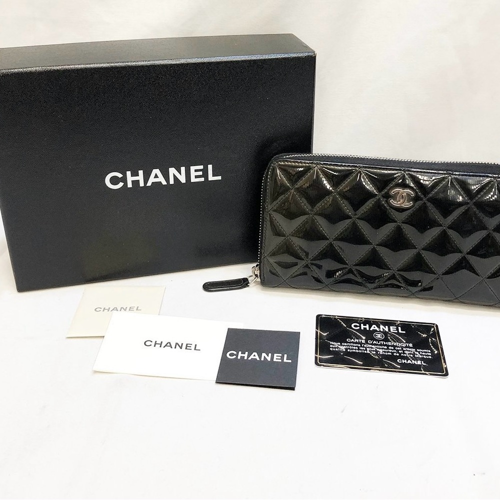 Authentic Chanel zip wallet in patent  leather